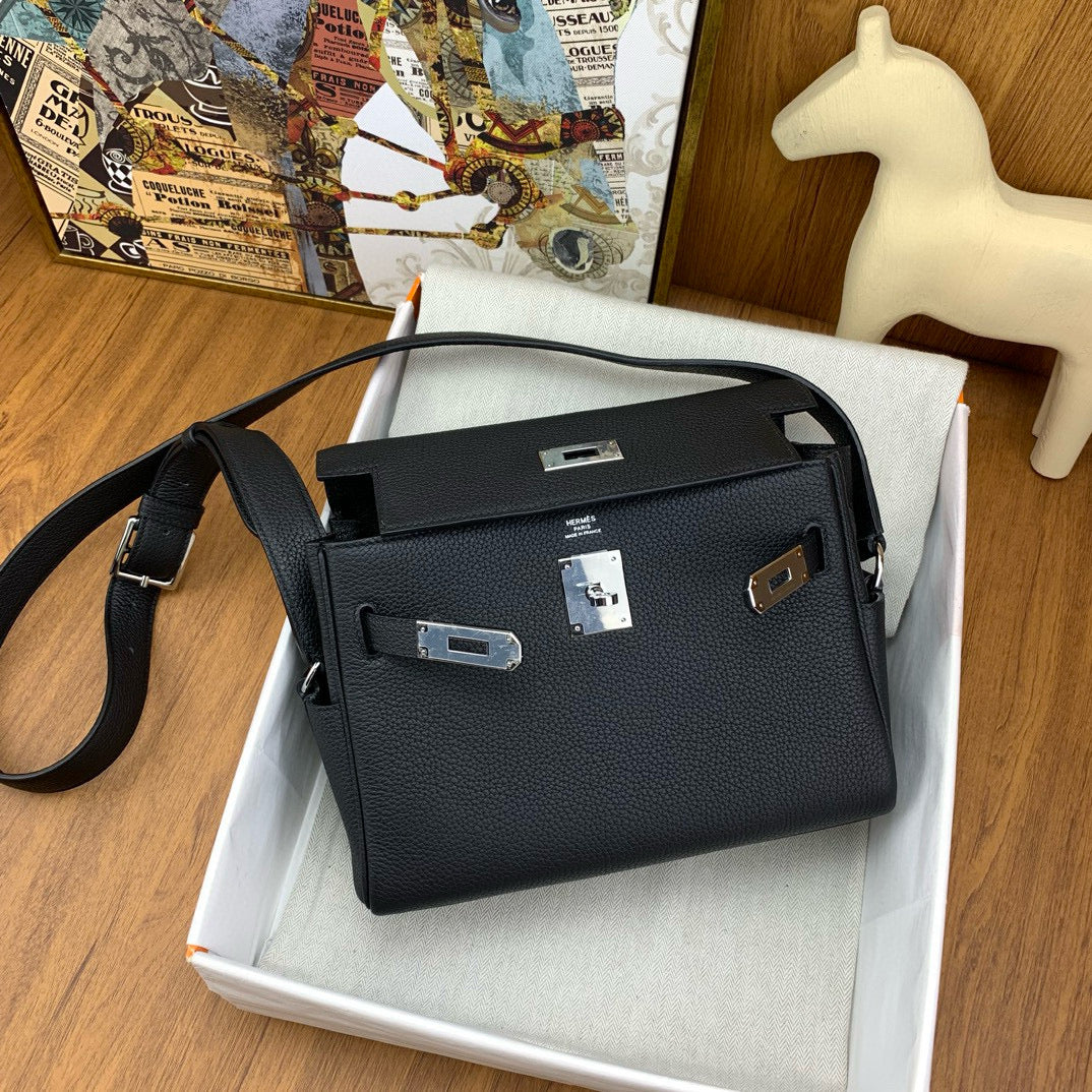 HERM KELLY MESSENGER 25