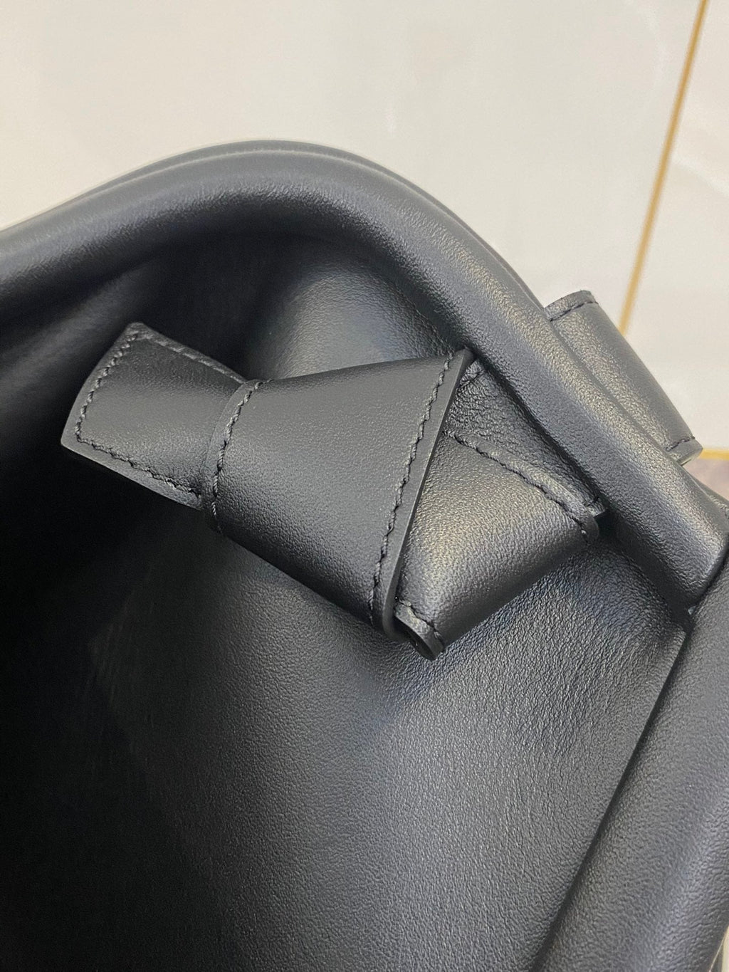 TRIANGLE HANDLE BAG 31 IN BLACK LAMBSKIN