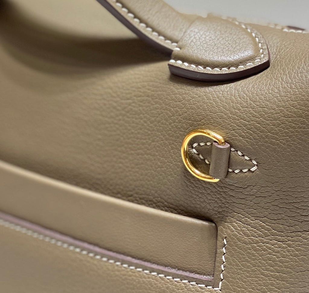 MINI 24/24 21CM IN TOGO ETOUPE EVERCOLOR CALFSKIN GOLD KELLY BUCKLE