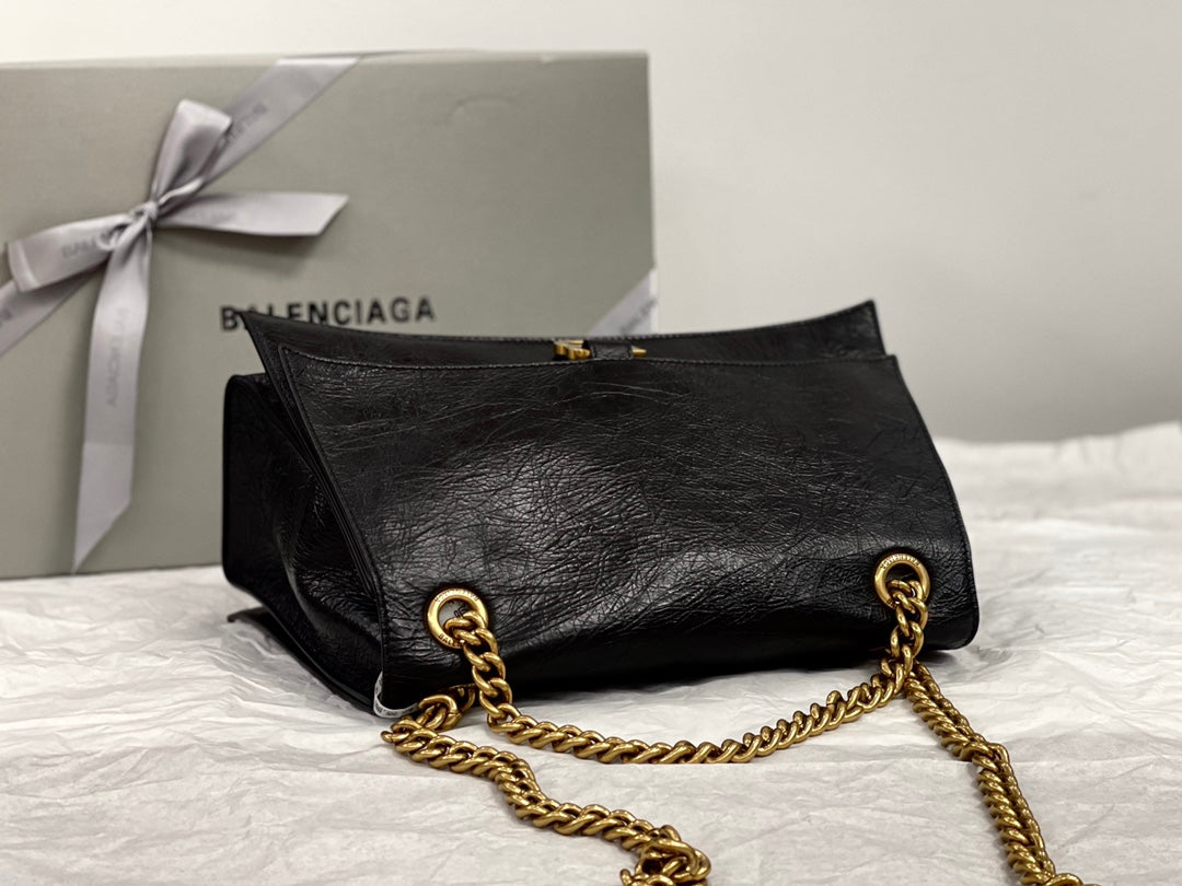 CRUSH MEDIUM CHAIN BAG 31 IN BLACK CRUSHED CALFSKIN GOLD HARDWARE
