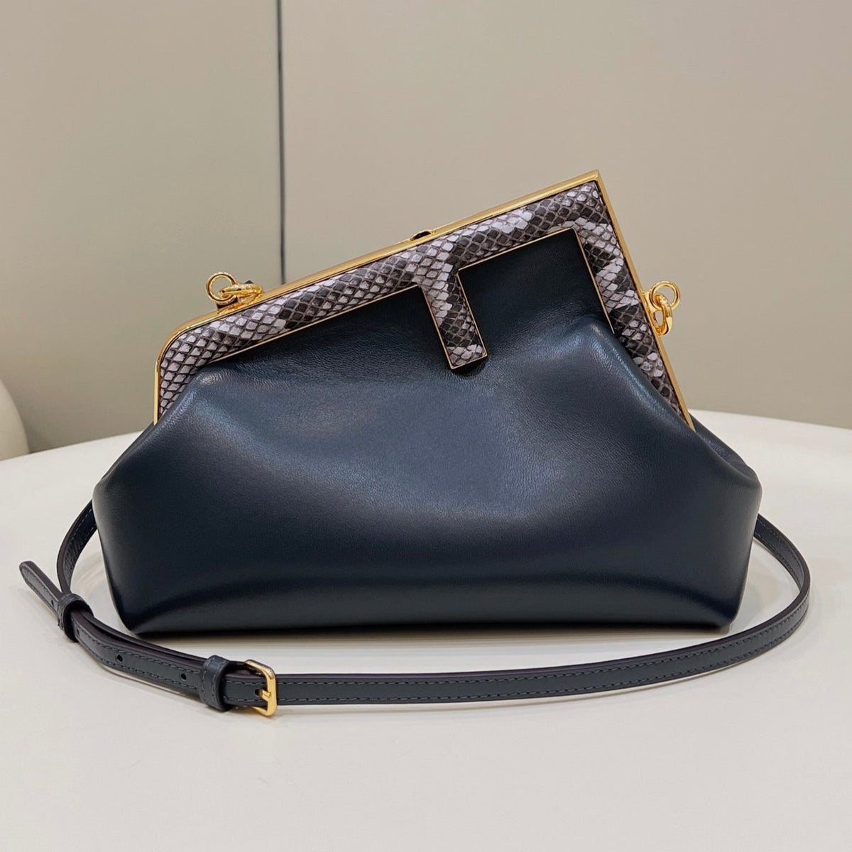FENDI FIRST SMALL 26 BLACK LEATHER BAG WITH EXOTIC DETAILS