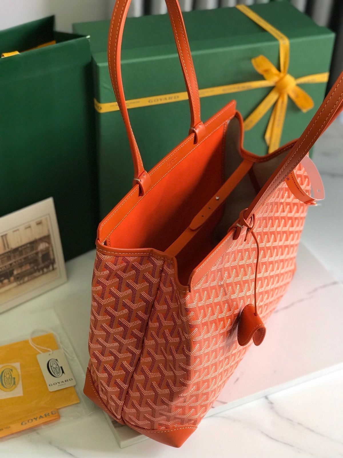 BELLECHASSE BIAUDE PM BAG 36 IN ORANGE GOYARDINE CANVAS AND CALFSKIN TRIM