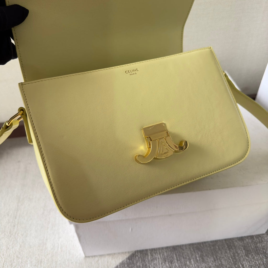 CLASSIQUE TRIOMPHE BAG 22 IN YELLOW CALFSKIN