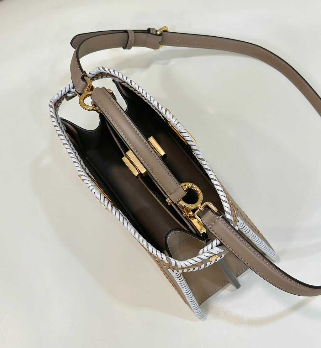 PEEKABOO ISEEU 27 IN MEDIUM BROWN INTERLACED CALFSKIN GOLD HARDWARE