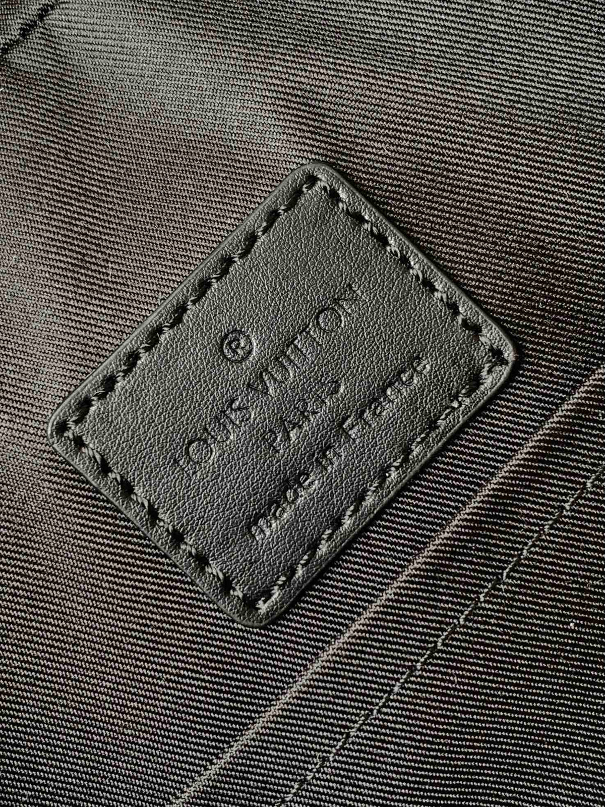 DISCOVERY BACKPACK 41 IN BLACK MONOGRAM MACASSAR CANVAS AND CALFSKIN