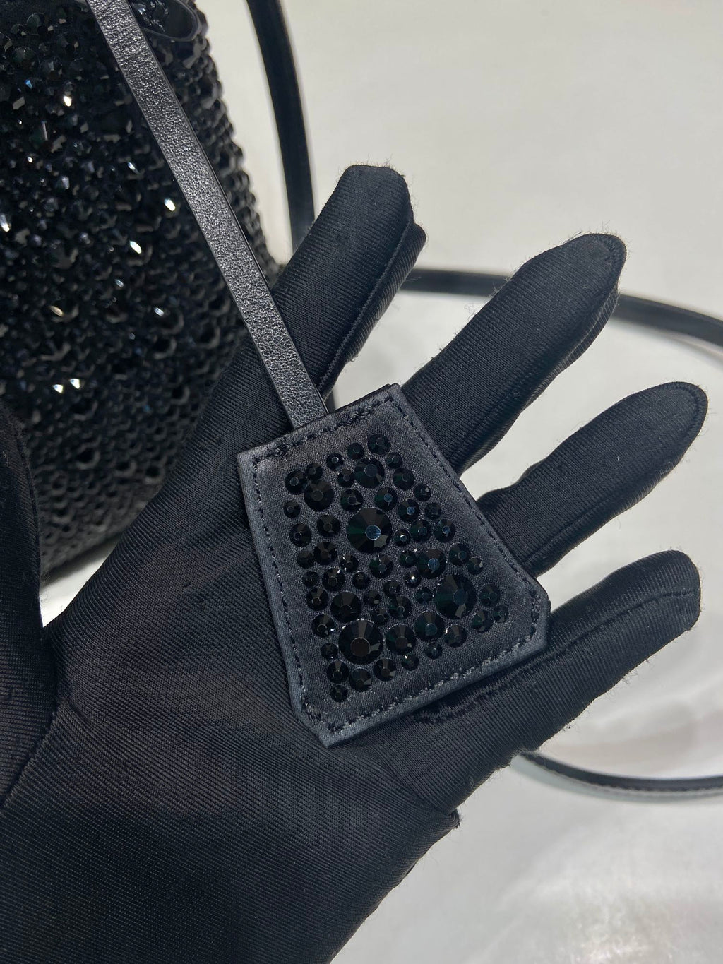 PANIER BUCKET BAG 16 IN BLACK CALFSKIN ATTACHED FULL CRYSTALS