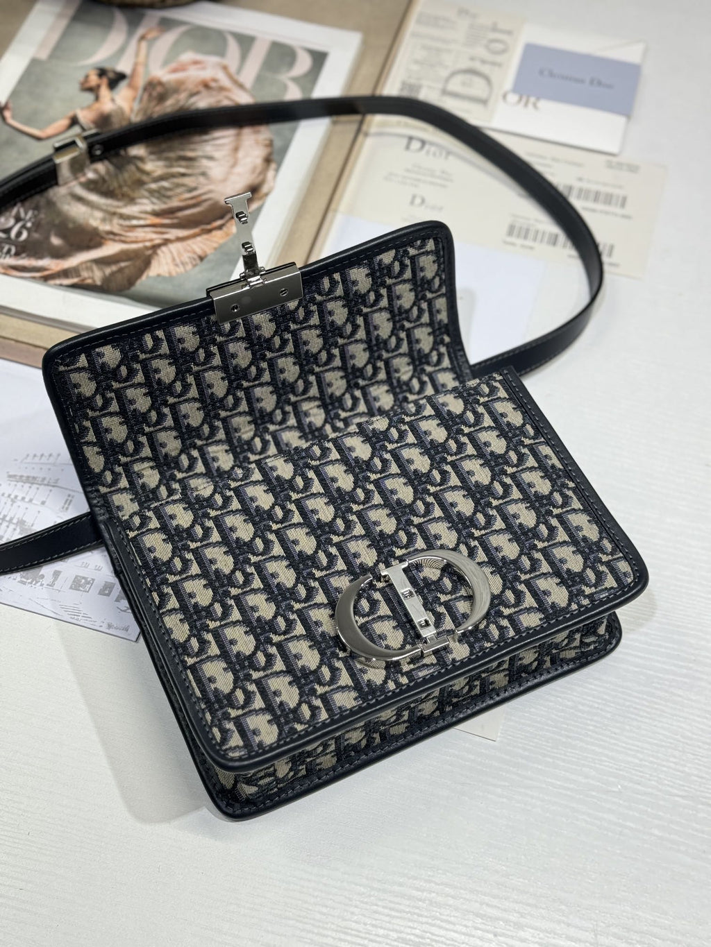 MONTAIGNE EAST-WEST BAG 24 IN BLACK LAMBSKIN AND MONOGRAM OBLIQUE JACQUARD