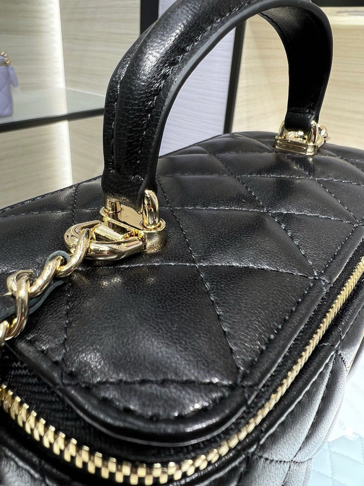 VANITY 17 TOP HANDLE IN BLACK QUILTED LAMBSKIN GOLD HARDWARE