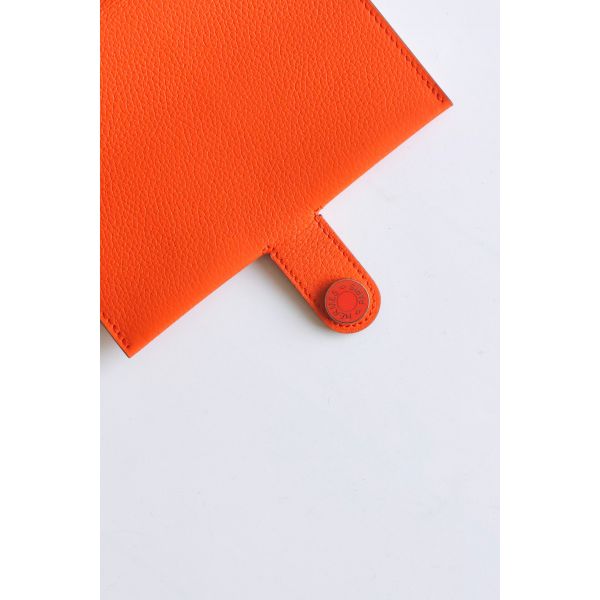 HERM R.M.S Passport Holder in Orange Evercolor Calfskin
