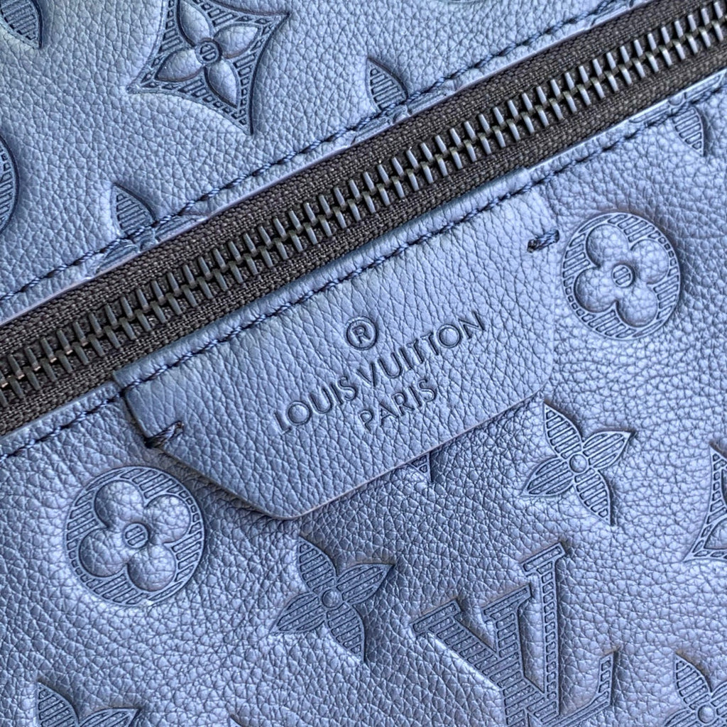 DISCOVERY PM BACKPACK 38 IN NAVY BLUE LAMBSKIN EMBOSSED MONOGRAM LOGO