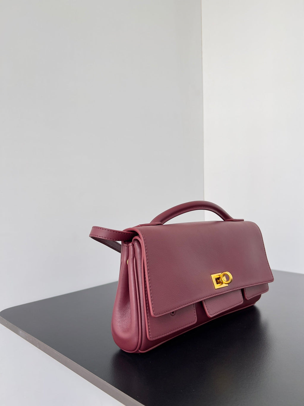 BEL AIR CLUTCH 27 IN BURGUNDY RED NAPPA LAMBSKIN GOLD HARDWARE