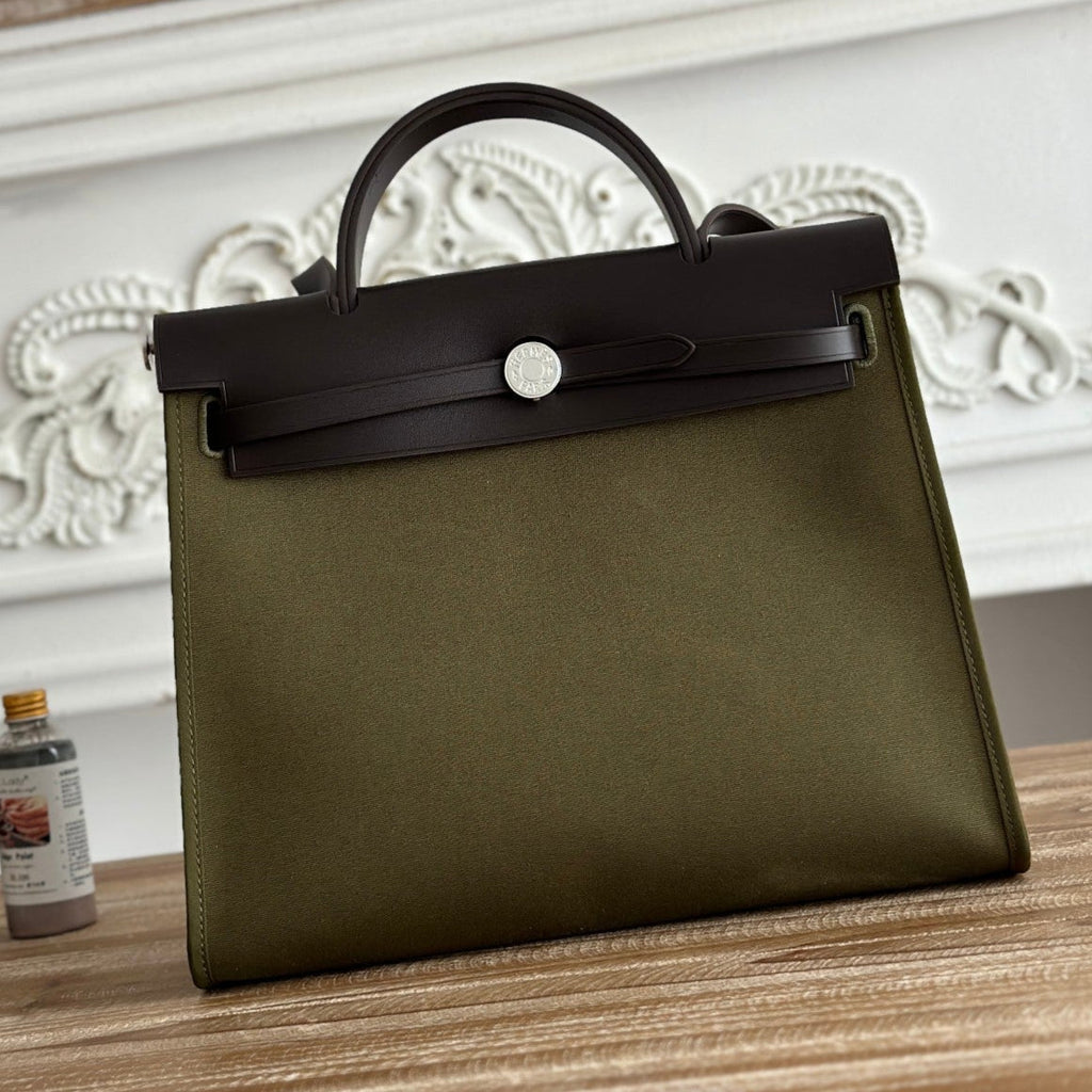 ZIP CABINE 31 BAG IN OLIVE GREEN CANVAS AND BLACK CALFSKIN