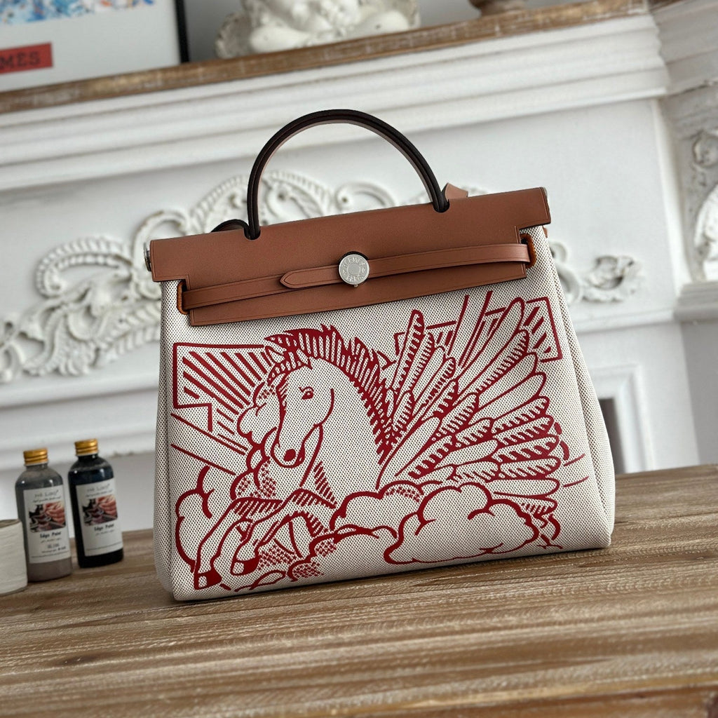 HERBAG ZIP 31 RETOURNE PEGASE POP BAG IN OFF-WHITE MIX RED CANVAS AND HUNTER COWHIDE