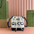 SMALL DRAWSTRING SHOULDER BAG 21 IN WHITE CANVAS DARK BLUE CALFSKIN
