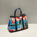 GARDEN PARTY 36 IN MULTICOLOR TOILE H CANVAS BLUE NAVY CALFSKIN TROPICAL ABSTRACT LANDSCAPE PRINT