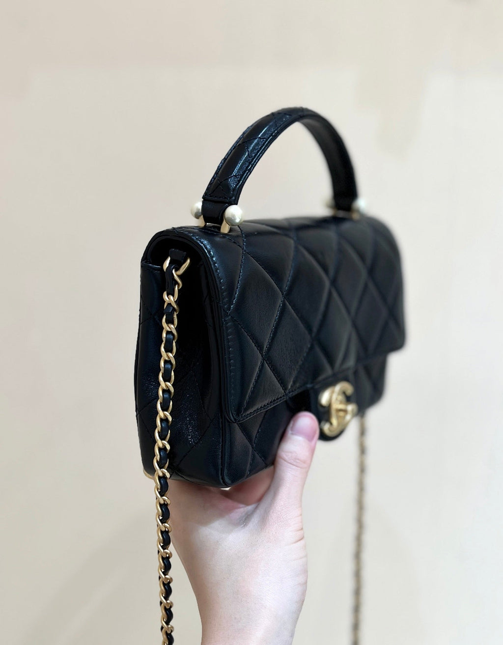 PEARL LIMITED EDITION FLAP BAG WITH HANDLE 20 IN BLACK LAMBSKIN