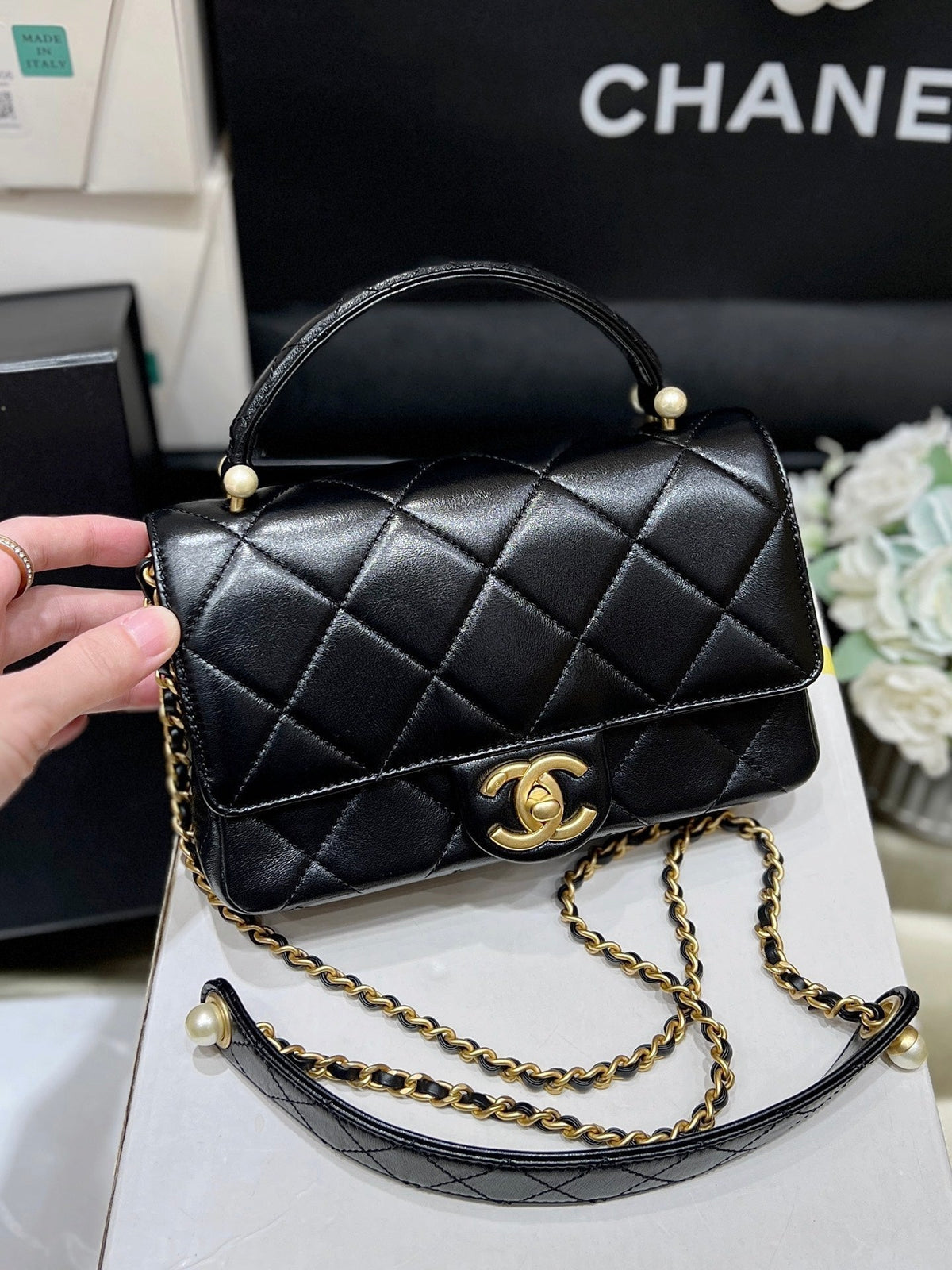 PEARL LIMITED EDITION FLAP BAG WITH HANDLE 20 IN BLACK LAMBSKIN